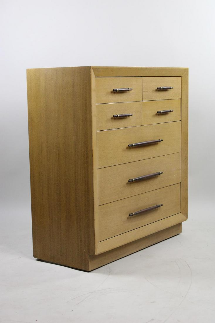 Mid-Century Modern John Stuart Blonde Dresser: Mid-Century Modern John Stuart Blonde Dresser. Blonde dresser has 3 large drawers & 4 small, with wooden handles in contrasting deep reddish brown wood. Marked John Stuart Inc in upper left drawer, Di
