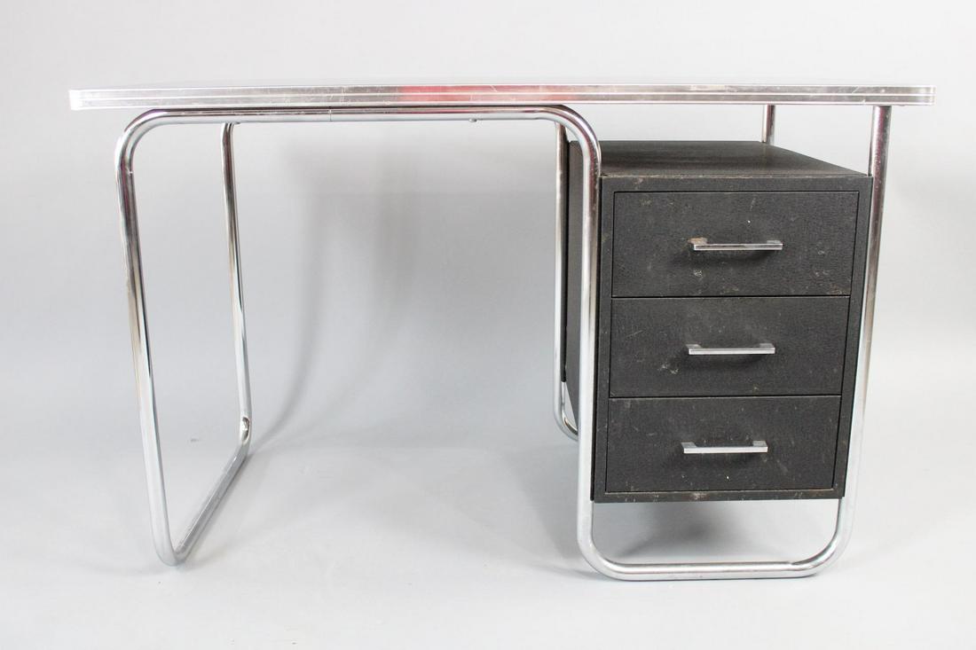 Art Deco Black & Tubular Chrome Desk, Robert Slezak Bauhaus Style: Art Deco Black & Tubular Chrome Desk, Bauhaus Style. This is a wonderful desk with Bauhaus styling much like Robert Slezak. Full functional drawers and comes with custom aftermarket glass top. The des