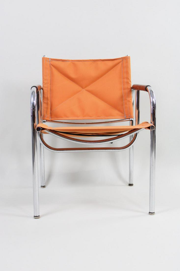 Mid-Century Modern Orange Lounge Chair, Hans Eichenberger: Mid-Century Modern Orange Lounge Chair, Hans Eichenberger. Chair has an adjustable back which can tilt at different angles, with orange fabric upholstery on a chrome finish frame and leather arm guard