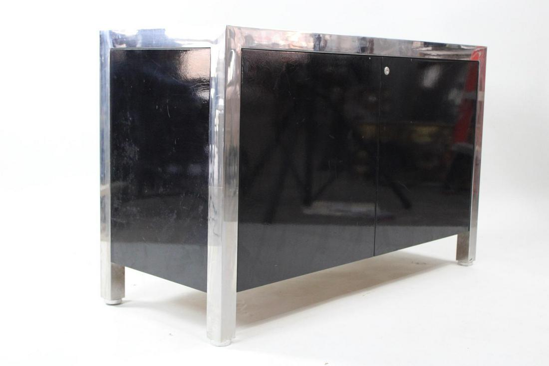 Pace Collection Black Laqcuer & Polished Steel Cabinet: Pace Collection Black Laqcuer & Polished Steel Cabinet. This postmodern cabinet opens to 4 drawers. There is no key unfortunately. This is a very heavy and well made piece. Dimensions are 30 in h x 48