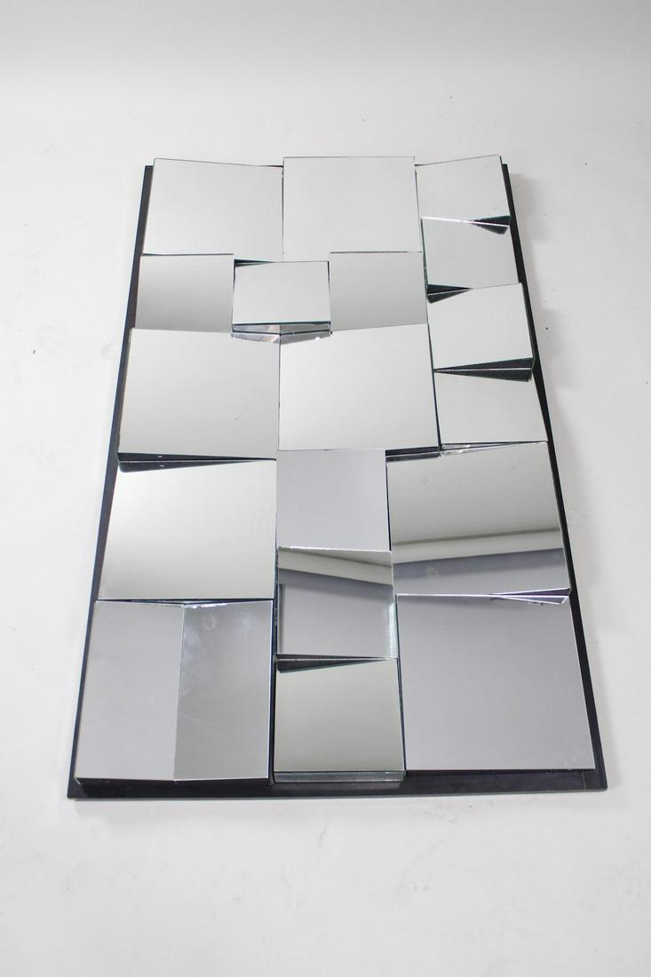Mid Century Modern Cubist Slopes Mirror, Neal Small: Mid Century Modern Cubist Slopes Mirror, Neal Small. There is no mark or signature but this mirror is attributed to Neal Small. Dimensions are 58 in h x 34 in w x 3 in d. Condition is very good, one s