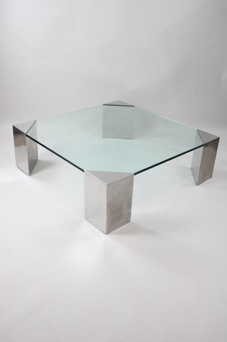 Postmodern 4-ft Square "Four Triangles" Coffee Table, Jay Spectre and Geoffrey Bradfield: Postmodern 4-ft Square "Four Triangles" Coffee Table, Jay Spectre and Geoffrey Bradfield. We were able to find one other example of this Coffee Table consisting of four polished metal corners supporti