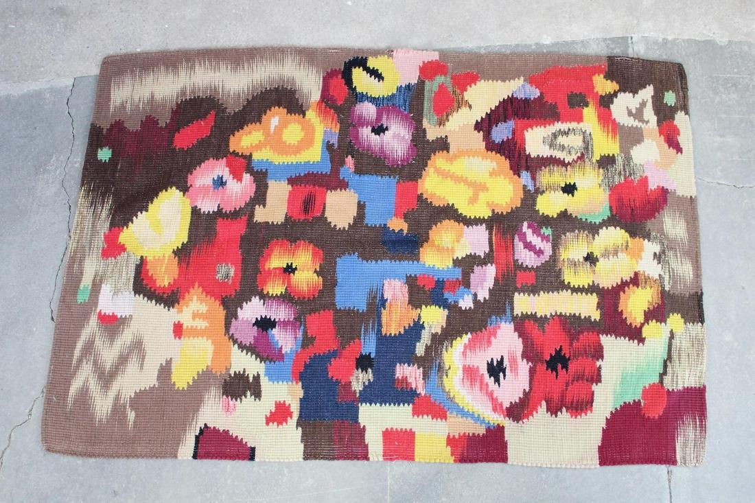 Modern Colorful Floral Abstract Wool Rug: Modern Colorful Floral Abstract Wool Rug. Vibrant area rug in a thick flat weave. Dimensions are 79 in h x 53 in w x .25 in d. Condition is good, with no holes, rips or stains. Please call or email fo