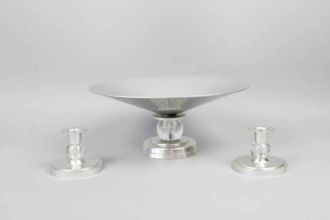 Art Deco Aluminum Compote & Candlesticks Lurelle Guild for Kensington: Art Deco Aluminum Compote & Candlesticks Lurelle Guild for Kensington. This is a great set made from Aluminum and glass. Marked Kensington. Dimensions are 5.75 in h x 13.5 in w x 13.5 in d. Condition