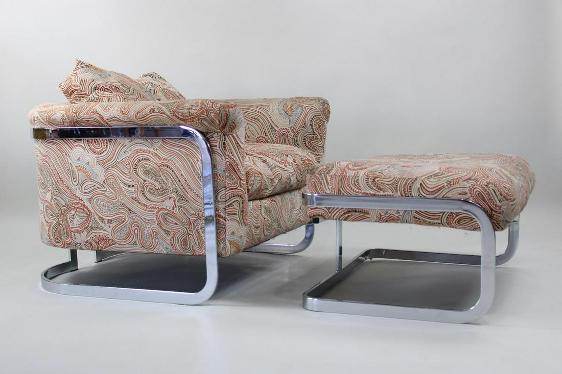 Mid Century Modern Milo Baughman Style Chrome Club Chair and Ottoman: Mid Century Modern Milo Baughman Style Chrome Club Chair and Ottoman. Heavy polished chrome frame with paisley upholstery. Dimensions are 24.5 in h x 33.5 in w x 33 in d. Seat height is 16 in. Conditi