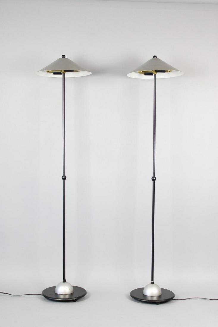 Pair of Postmodern Minimalist Floor Lamps, Silver & Black: Pair of Postmodern Floor Lamps, Silver & Black. This is a great minimalistic pair of floor lamps. No makers mark. Dimensions are 52.5 in h x 11.25 in w x 11.25 in d. Condition is very good. Please cal