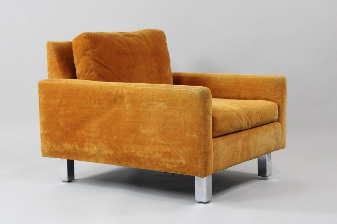 Mid-Century Modern Orange Velvet Lounge Chair, Contempo Concepts: Mid-Century Modern Orange Velvet Lounge Chair, Contempo Concepts. This chair has chrome legs, cubist shape and velvet upholstery. The tag reads Contempo Concepts. Dimensions are 27 in h x 31 in w x 34