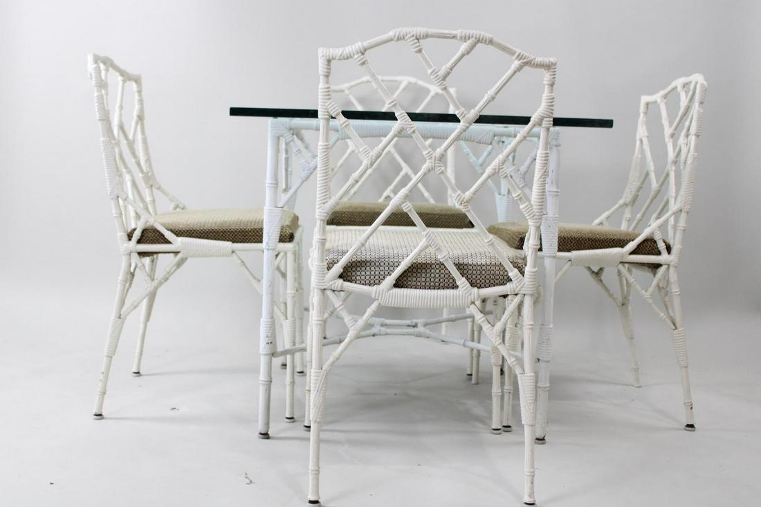 Hollywood Regency Iron Chippendale Bamboo Chairs & Table: Hollywood Regency Iron Chippendale Bamboo Chairs & Table. This heavy lacquered white set has 4 chairs in iron and a matchign table which is aluminum. Nice thick glass table top. Dimensions are 35.5 in