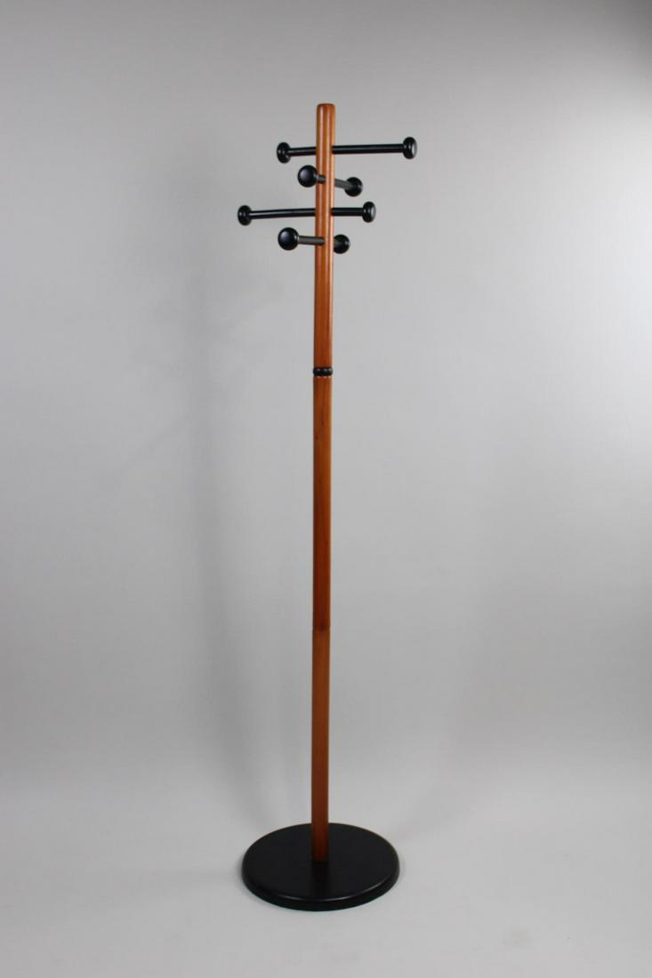 Mid-Century Modern Scandinavian Teak Sputnik Coat Rack: Scandinavian Teak Sputnik Coat Rack. Great coat rack has a stem of natural finished wood, with 8 hooks and base ebonized. Dimensions are 67 in h x 14.5 in w x 14.5 in d. Condition is good with light s