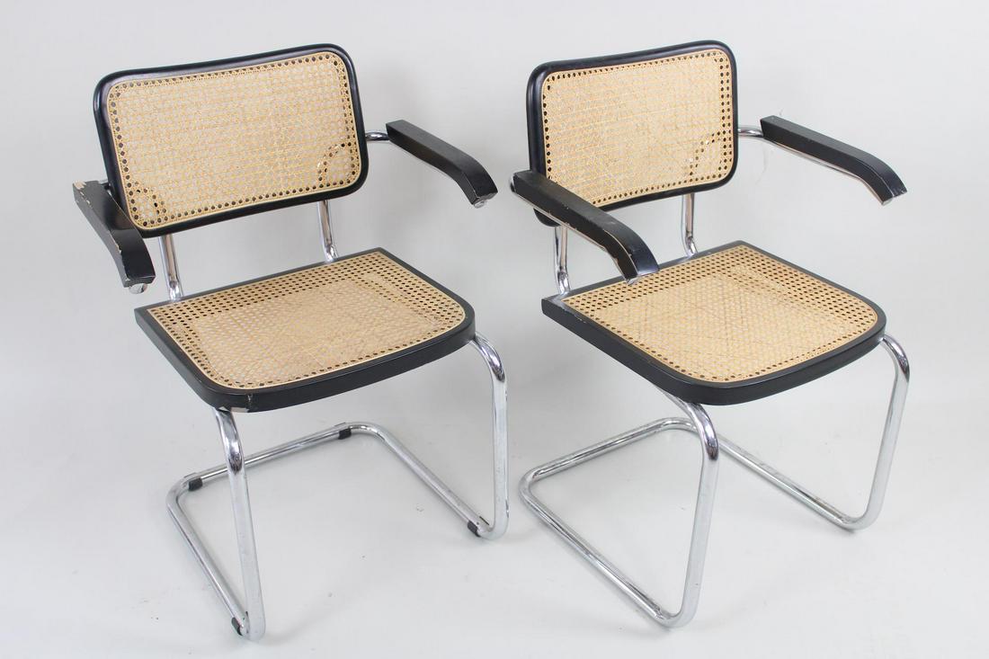 Pair of Mid-Century Modern Marcel Breuer Black Cesca Chairs: Pair of Mid-Century Modern Marcel Breuer Black Cesca Chairs. Wonderful matching pair have caned backs and seats, with black painted wooden frames and cantilevered metal legs. No attribution marks. Dim