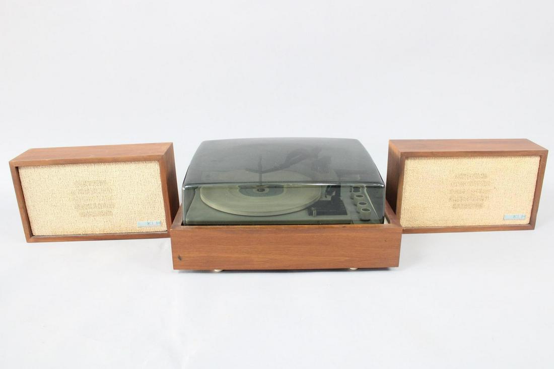 Mid Century Modern KLH Model 11 Turntable & Speakers: Mid Century Modern KLH Model 11 Turntable & Speakers. This is a classic design for your mid century modern home. We plugged it in and the turntable moved slowly, too slowly to test the speaker, needs 