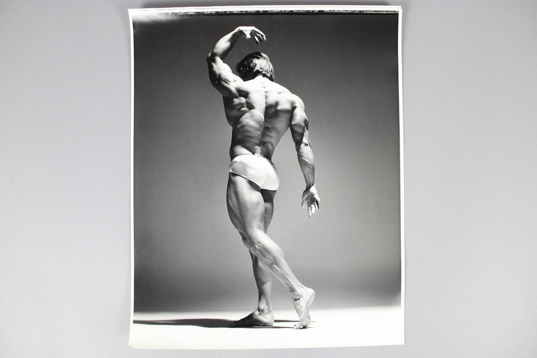 Michael Avedon Photographs; Frank Zane Bodybuilder, Male Physique: Michael Avedon Photographs; Frank Zane Bodybuilder. Lot of 4 photos of bodybuilder Frank Zane, three-time Mr. Olympia, by Michael Avedon. Dated 1973. and from the archive of After Dark magazine. Also 