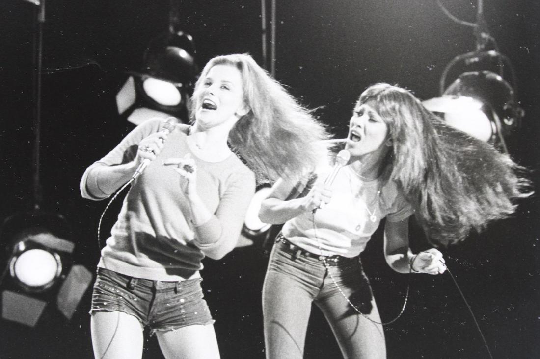 Michael Childers Photographs; Ann-Margret & Tina Turner: Michael Childers American Photographer b.1944. This is an excellent set of 5 photographs of Ann-Margret and Tina Turner performing on stage. These photos are dated 1975. Quantity: 5 Size 12 x10 Photog