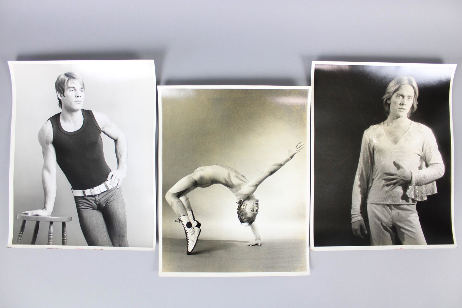 Kenn Duncan Photographs; 1970s Men's Fashion: Kenn Duncan American Photographer 1928-1986. Lot of 18 B&W photos of men in fabulous 1970s fashion and costumes, including a sequin costume, a star belt, cowboy hats, stripes, fringed vests, bell bott