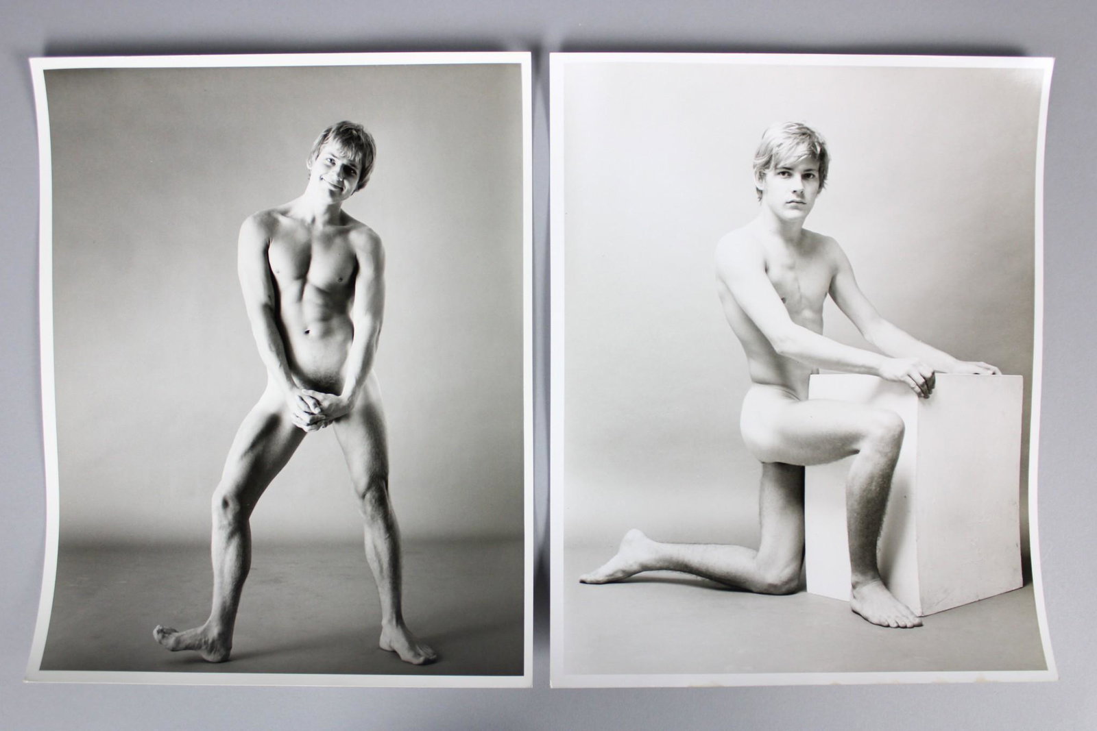 Kenn Duncan Photographs; Nude Men, Gay Interest: Kenn Duncan American Photographer 1928-1986. Lot of 12 B&W photos of nude men in various poses, including one in the shower, one at the beach, and several studio shots. Undated but from 1968-1983. Fro