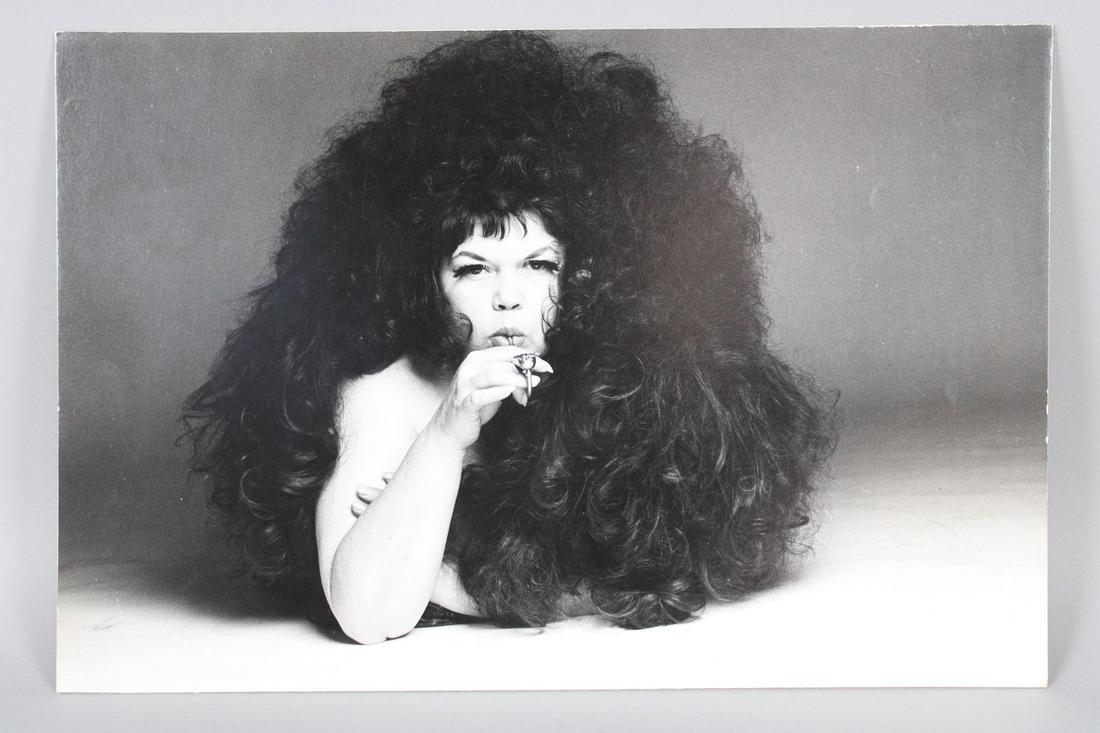Black & White Photograph of Tally Brown from Andy Warhol's Factory: Black & White Photograph of Tally Brown from Andy Warhol's Factory. This is a fantastic photograph of Tally Brown lying down smoking a pipe. It is mounted on board. Quantity: 1 Size 12.75 x 19.25 Phot