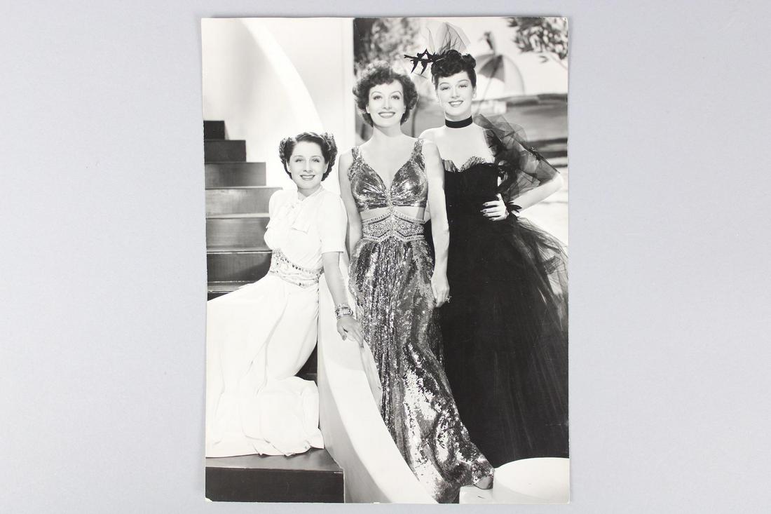 MGM Movie Photographs; Norma Shearer, Joan Crawford, Rosalind Russell: MGM Movie Photographs; Norma Shearer, Joan Crawford, Rosalind Russel. This is an great photograph depicting the three celebrities in glamorous dresses. It was from their movie, "The Women." Quantity: 