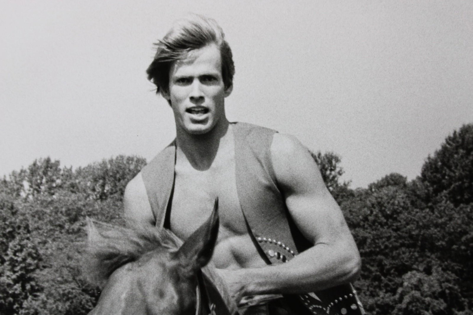 Kenn Duncan Photographs; Outdoor Models: Kenn Duncan American Photographer 1928 -1986. Lot of 8 B&W photos of male and female models in outdoor locations including the beach and on horseback. These photos are undated but are from 1968-1983. 
