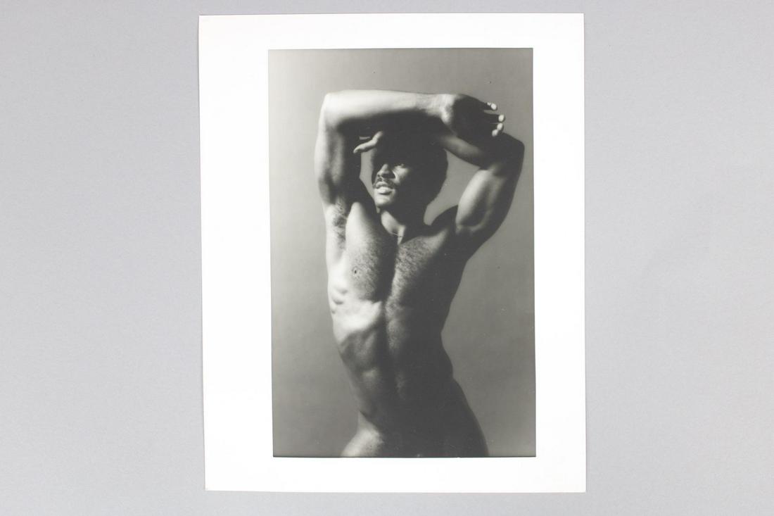 James Armstrong Photograph; Nude Odis Campbell w/Color Negatives: James Armstrong American Photographer 1925-2015. This lot includes 4 nude black & white photographs of the male model, Odis Campbell and four color negatives. Undated but from 1968-1983. Quantity: 4 p