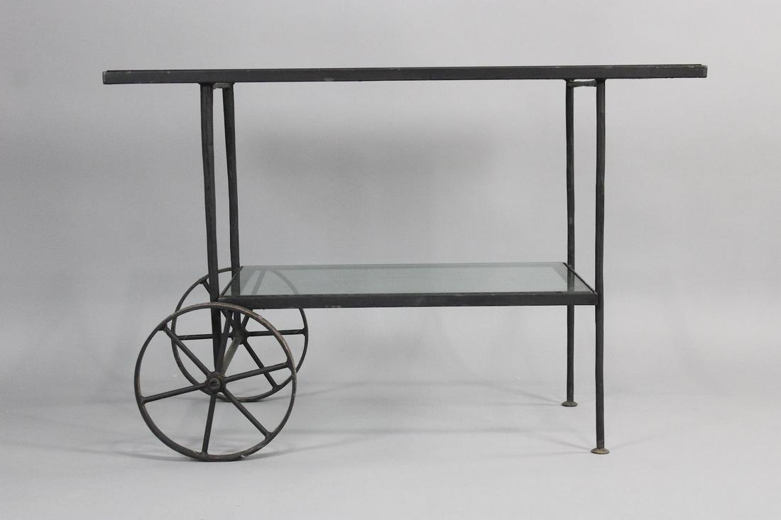 Mid Century Modern Minimalist Iron Bar Cart, Indoors or Out: Mid Century Modern Iron Bar Cart, Indoors or Out. Great minimal design. Very heavy high quality. Dimensions are 29.25 in h x 44.25 in w x 21 in d. Condition is very good. Please call or email for a de