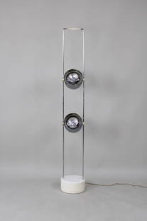 Space Age Chrome Spotlight Floor Lamp: Mid Century Modern Space Age Spotlight Floor Lamp. This is a very heavy weighted base, with matching white plastic fittings and handle at the top. Dimensions are 61.75 in h x 8.5 in w x 8.5 in d.