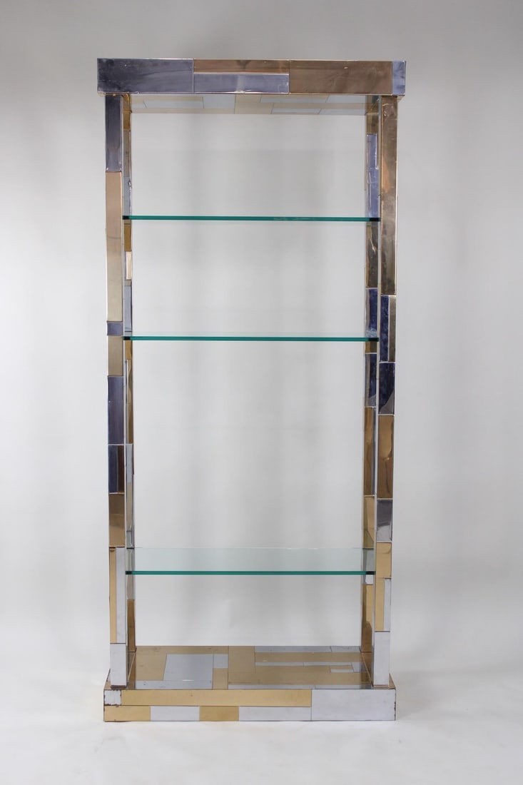 Mid-Century Modern Brass & Chrome Cityscape Shelf Wall Unit, Paul Evans Style: Mid-Century Modern Brass Chrome Display Shelf, Paul Evans Style. This tall shelf has an interlocking geometric pattern of reflective brass and chrome rectangles, with 3 glass shelves at varying height
