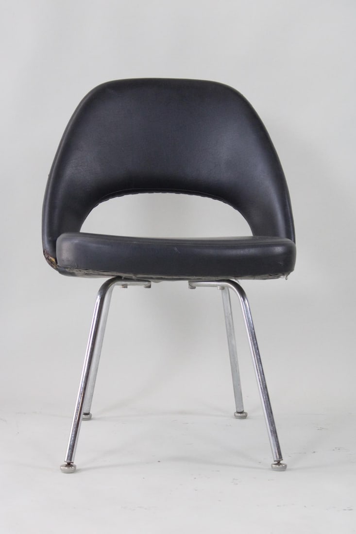 Mid-Century Modern Black & Metal Executive Chair, Eero Saarinen Knoll: Mid-Century Modern Black & Metal Executive Chair, Eero Saarinen Knoll. Armless with bent metal legs, this minimalist black upolstered cushioned chair has a curved back. Marked with an IBM sticker unde