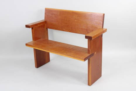 Bauhaus Wooden Bench 1977, Manner of Gerrit Rietveld: Bauhaus Wooden Bench in the Manner of Gerrit Rietveld, Jim Nickel 1977. Wooden bench with plank seat, back and arms, and stamped "Jim Nickel 1977" under the seat. Dimensions are 32 in h x 39.75 in w x