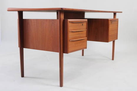 Danish Modern Teak Desk, Peter Lovig Nielsen: Danish Modern Teak Desk, Double-Sided, Peter Lovig Nielsen. Raised "floating" desktop with high edge lip along one edge, one side featuring pull drawers, the other side with cubby storage. No maker's