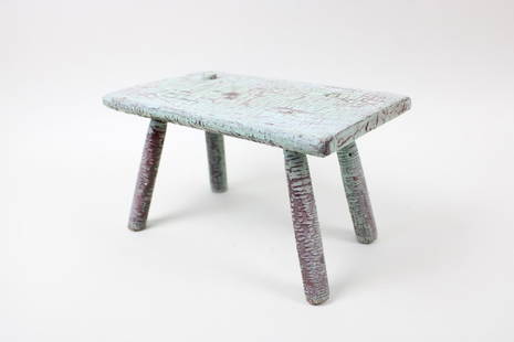 Primitive Small Blue Painted Wooden Stool: Primitive Small Blue Painted Wooden Stool. Small 4 legged stool with blue crackled paint over red. Dimensions are 6.5 in h x 12 in w x 6.5 in d. Condition is good with surface wear and paint