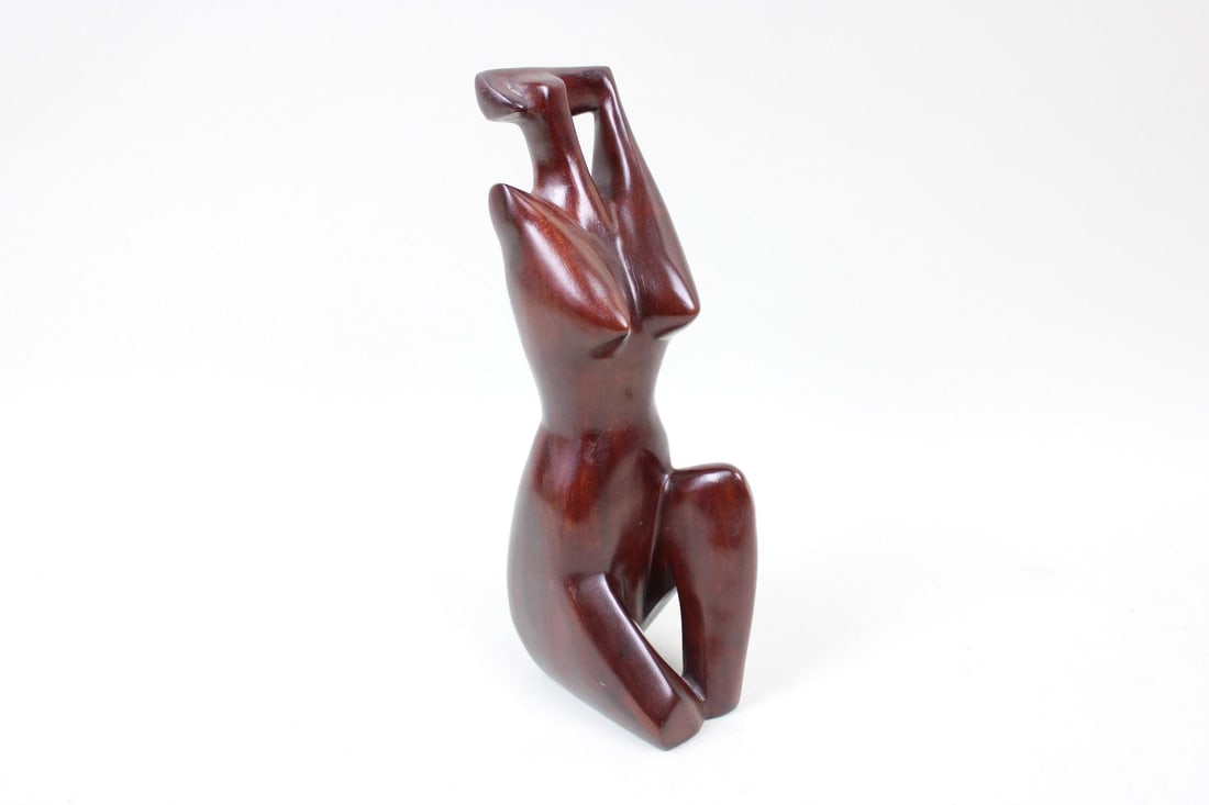 Abstract Mahogany Woman Sculpture, Pantalcraft Haiti: Abstract Mahogany Woman Sculpture, Pantalcraft Haiti. This figure has most of her body in a polished rendering of a female nude. Marked made in Haiti on bottom, we believe this is by Pantalcraft. Dime