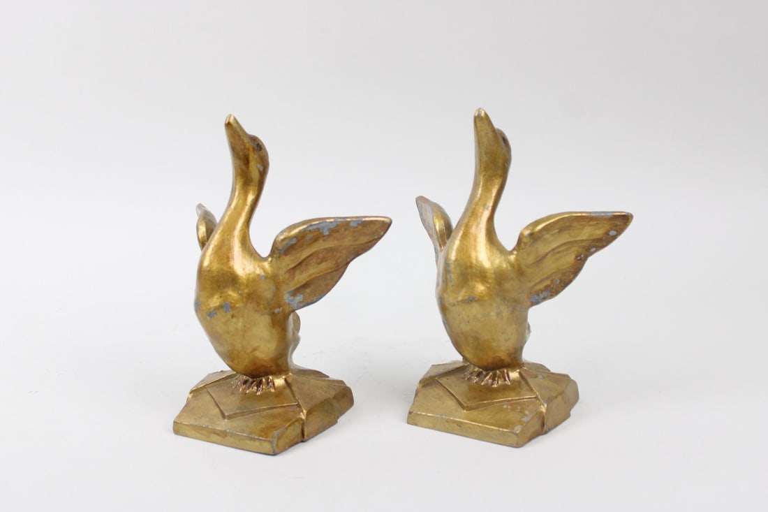 Pair of Gilt Art Deco Goose Bookends, Frankart Style: Pair of Gilt Art Deco Goose Bookends. This is an excellent pair of cast-metal, guilt geese bookends. They are about to take flight from an Art Deco designed base. They are in the style of Frankart, un