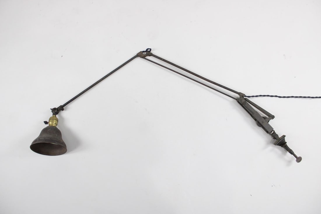 Industrial Dazor Floating Arm Drafting Table Lamp: Industrial Dazor Floating Drafting Table Lamp . Task lamp with adjustable "floating arm" and clamp for attaching to a table. "Dazor " is stamped on the adjusting mechanism. Dimensions are 30 to 40 in