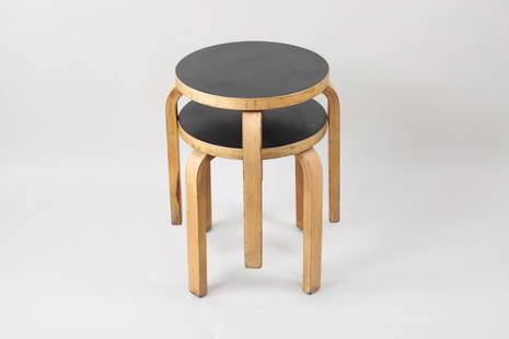 Pair of Alvar Aalto Stools, Bentwood & Black Top: Pair of Alvar Aalto Stools, Bentwood & Black Top. These two stacking stools have curved waterfall legs and round seats with black top surfaces. No maker's mark. See below how legs have been removed an