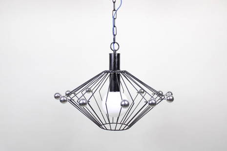 Mid-Century Modern Atomic Wire Cage Hanging Lamp: Mid-Century Modern Atomic Wire Cage Hanging Lamp. This hanging light fixture has a cage pendant made of black painted bent metal with chrome spheres affixed to every other bar. A metal chain holds the