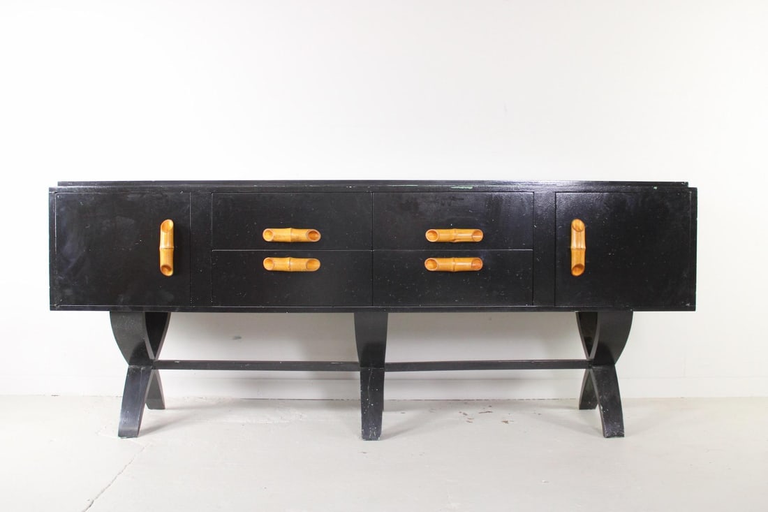 Mid Century Modern X-Base Credenza Chunky Bamboo Handles: Mid Century Modern X-Base Credenza Chunky Bamboo Handles. This black credenza has a more contemporary paint job of the black. The handles are oversized bamboo. Dimensions are 38.5 in h x 94.5 in w x 2