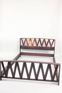 Mid Century Modern John Stuart Bed Frame: Mid Century Modern John Stuart Bed Frame. This twin bed frame has John Stuart tag. It has a woven design to the head and foot board. Dimensions are 32 in h x 56.5 in w x 79.5 in d. Condition is fair,