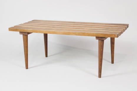 Mid-Century Modern Slat Wood Bench: Mid-Century Modern Slat Wood Bench. This minimalist wooden seat has rounded tapered legs supporting the 3-foot wide slat bench top. Dimensions are 14 in h x 36 in w x 17.25 in d. Condition is good wit