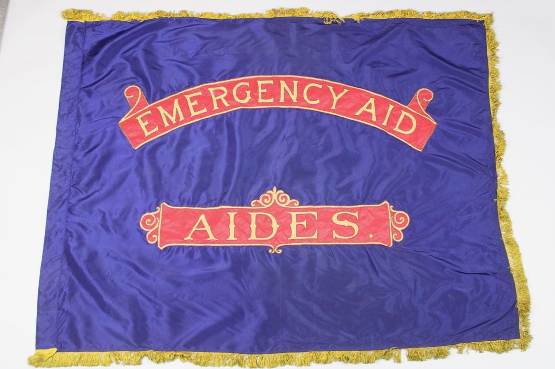 Large Silk WWI Philadelphia Emergency Aid Society Flag: Large Silk WWI Philadelphia Emergency Aid Society Flag. This banner flag, measuring about 4.5' x 5.5' big, features the embroidered red and gold logo for 'Aides' of the Philadelphia Emergency Aid Soci