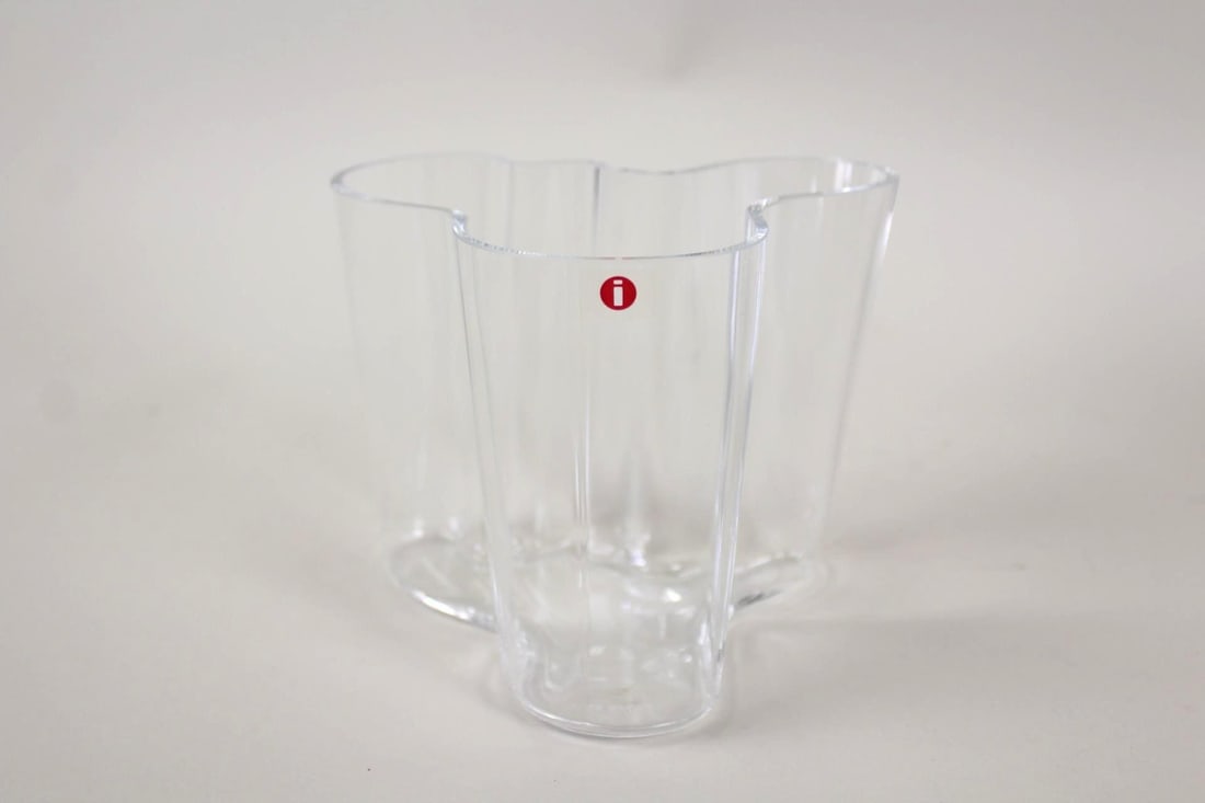 Clear Glass "Savoy" Vase in Original Box, Alvar Aalto for iittala: Clear Glass "Savoy" Vase in Original Box, Alvar Aalto for iittala. Clear vase with fluid lines, still in it's MOMA box. Designed by Alvar Aalto for iittala and made in Finland, with original sticker a