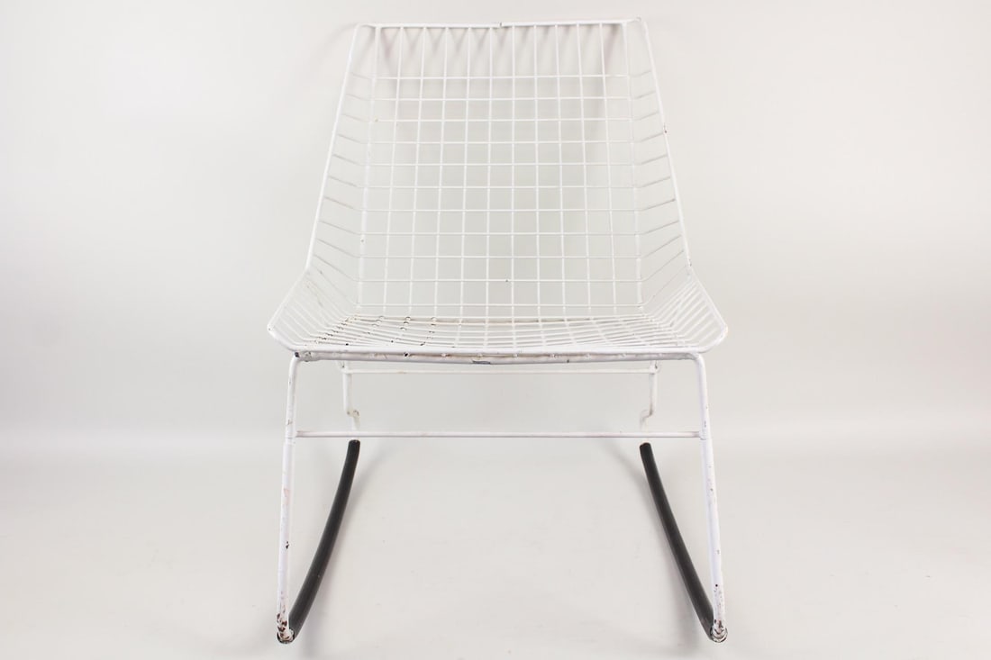 Mid-Century Dutch Modern Flamingo Rocking Chair, Cees Braakman for Pastoe: Mid-Century Dutch Modern Flamingo Rocking Chair, Cees Braakman for Pastoe. This wire metal chair is painted white and has black rubber wrapped along the curved feet on either side. No maker's mark, we