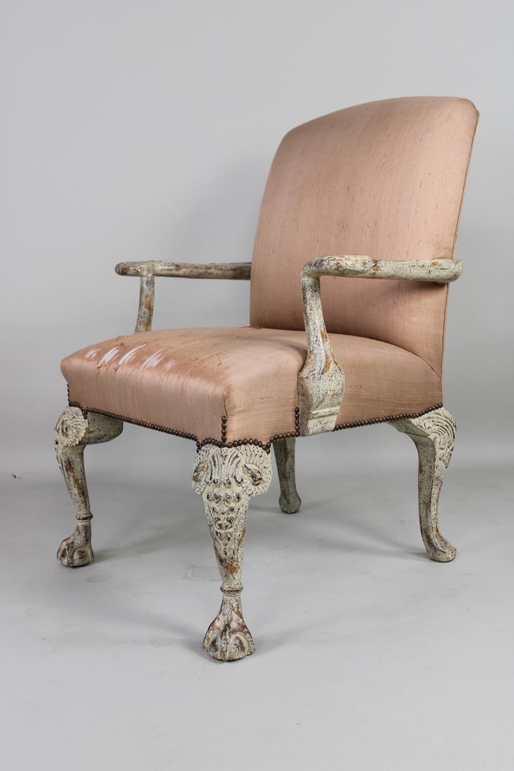 Ornately Carved George III Style Wood & Upholstery Claw Foot Armchair, Cal-Mode California: Ornately Carved George III Style Wood & Upholstery Claw Foot Armchair, Cal-Mode California. This large chair has peach colored upholstery on the seat and back cushions with white painted wooden cabrio