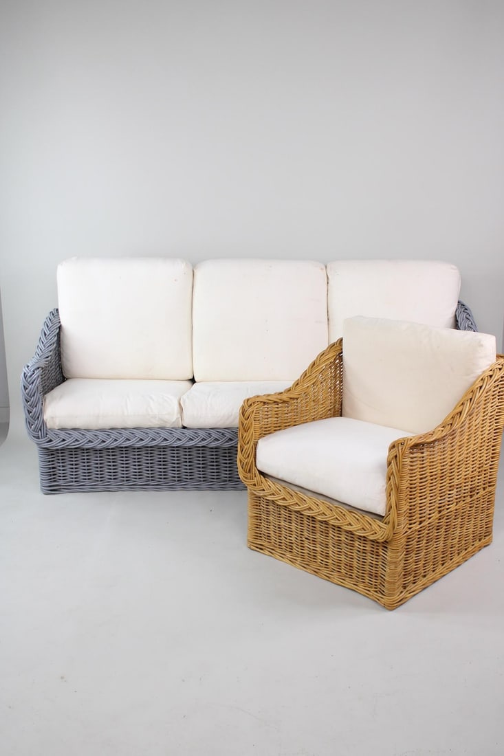 Set of Cubist Wicker Sofa & Chair, Michael Taylor Style: Set of Cubist Wicker Sofa & Chair, Michael Taylor Style. This lot includes a woven wicker 3-seater couch with thick braided trim, painted grey with white cushions, and a matching armchair in brown wic
