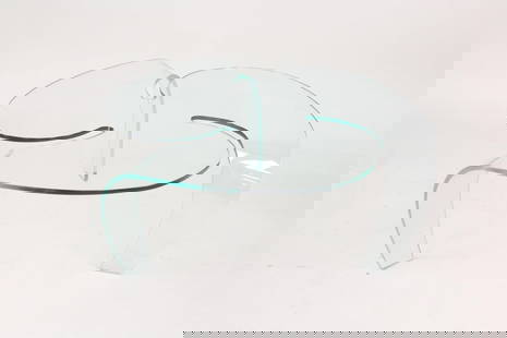 Postmodern Glass Propeller Coffee Table, Fiam Style: Postmodern Glass Propeller Coffee Table, Fiam Style. This table in the style of Hans von Klier designs for Fiam is entirely made of glass with 3 curved legs and a segmented top of swirling shapes. No