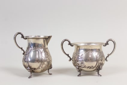 Pair of Ambassador Sterling Silver Sugar & Creamer, Lion's Head Feet