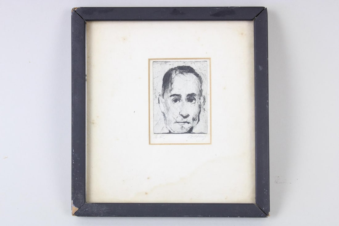 Miniature Etching of a Man, Christopher Coffey Artist Proof: Etching of a Man, Christopher Coffey Artist Proof. Small etching depicts a head portrait of a man. Signed by the artist lower right and on the back. Matted and in a black wood frame. Dimensions are 6.