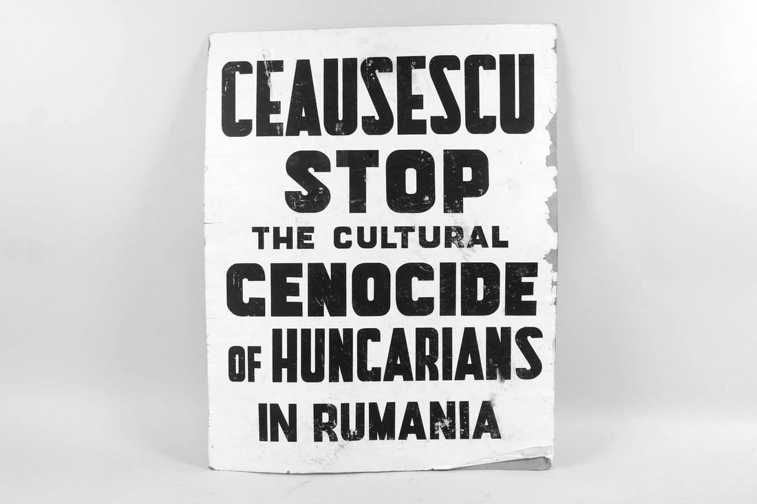 Protest Poster, "Ceausescu Stop the Genocide of Hungarians in Rumania": Black & White Protest Peace Sign, "Ceausescu Stop the Cultural Genocide of Hungarians in Rumania." This civil rights poster is printed on paper and mounted on board, and refers to Nicolae Ceausescu wh