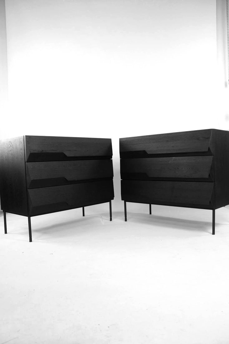 Pair of Black Oak 'Stairs' Chests of Drawers, by Alain van Havre for Ethnicraft: Pair of Black Oak Wood 'Stairs' Chests of Drawers, Ethnicraft. These matching wooden dressers in black finish have 3 geometric pull drawers on skinny tubular legs. No maker's marks, we believe these a