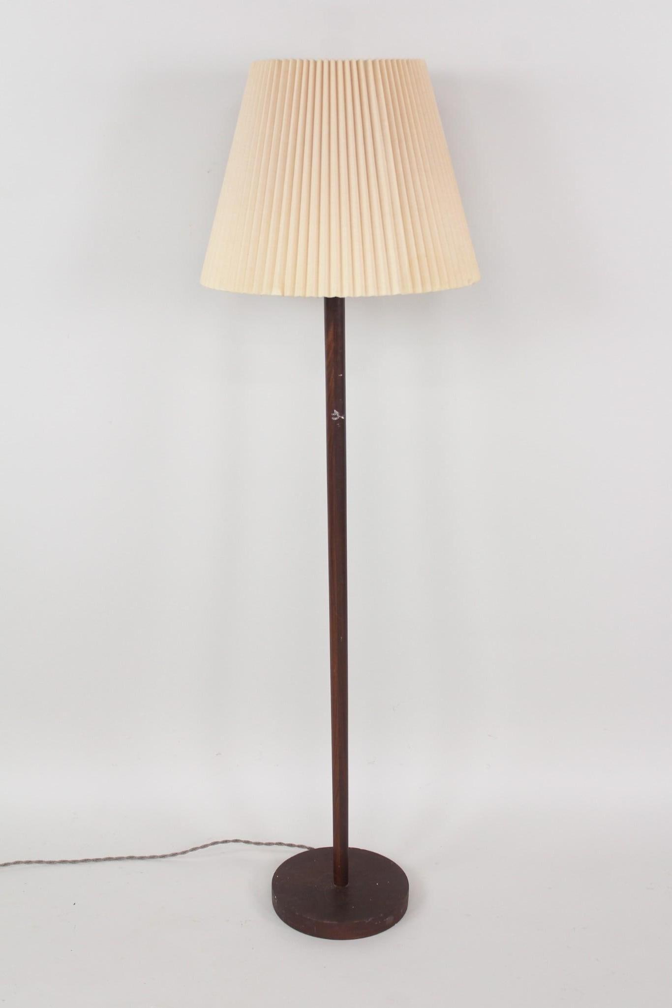 Minimalist Wood Floor Lamp with Accordion Shade, George Kovacs Style: Minimalist Wood Floor Lamp with Accordion Shade, George Kovacs Style. This wooden standing light has a thick disc base and simple straight rod body, with a ridged fabric funnel shade in cream color.Di