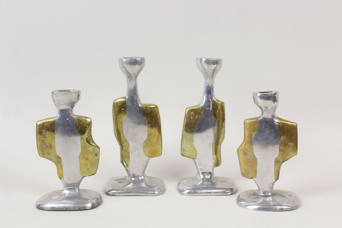 Set of 4 David Marshall Brutalist Mixed Metal Candlesticks: Set of 4 David Marshall Brutalist Mid-Century Modern Mixed Metal Candlesticks. Two pairs, in 2 sizes, of asymmetrical candlesticks in cast aluminum and cast brass. Unmarked.Dimensions are 6.75 in h x